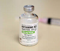 Medical vial of Ketamine HCl injection 500 mg/10 mL, a controlled substance with both therapeutic uses and potential for abuse