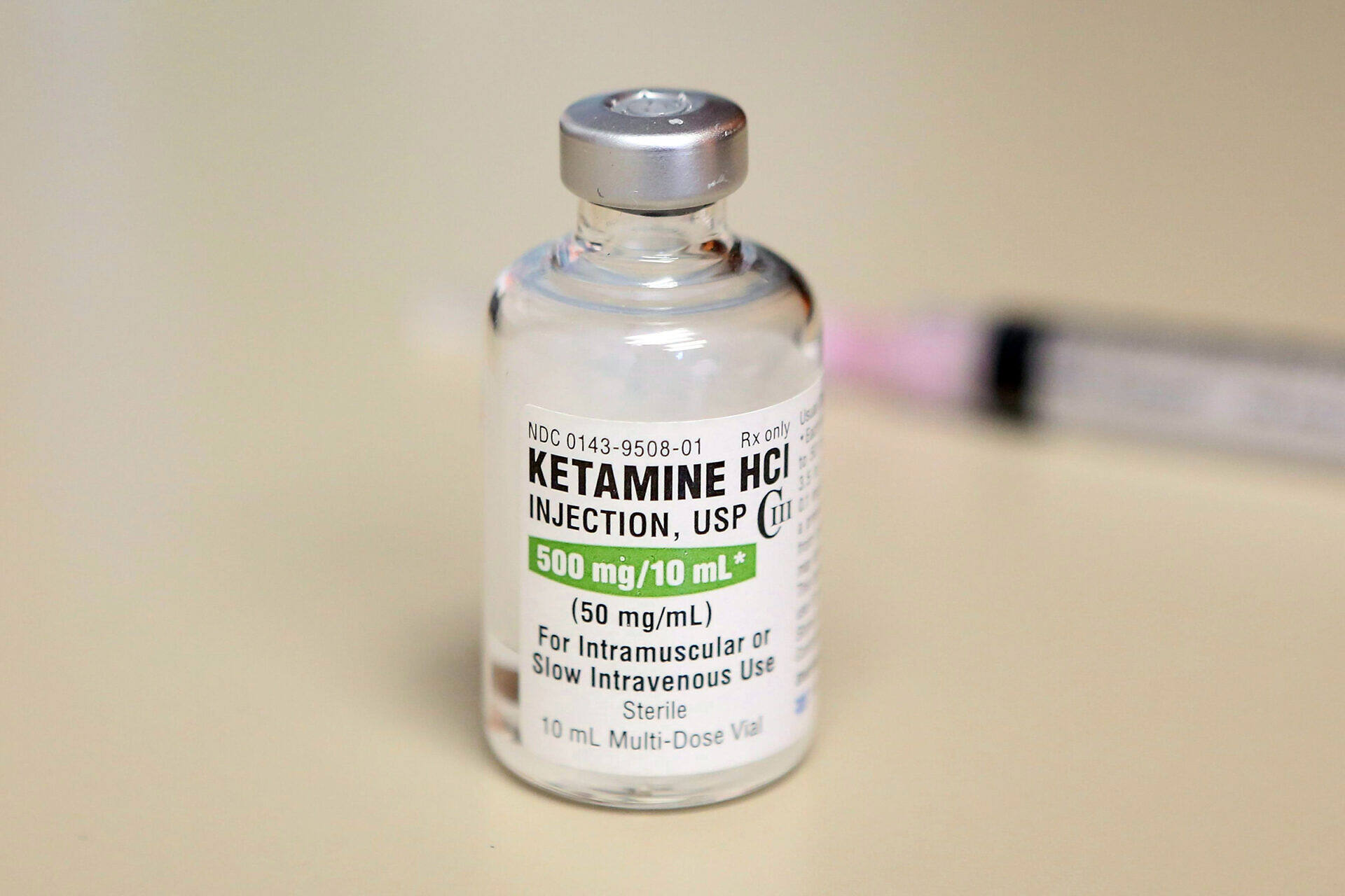 Medical vial of Ketamine HCl injection 500 mg/10 mL, a controlled substance with both therapeutic uses and potential for abuse