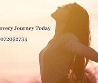 Silhouette of woman with arms outstretched against sunset, text reads 'Begin Your Recovery Journey Today Call 02072052734