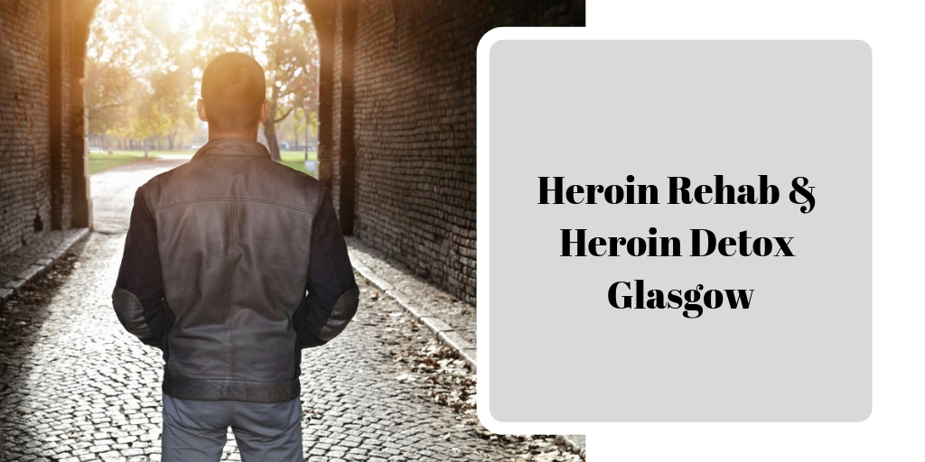 Man walking through brick archway towards sunlit park, with text overlay 'Heroin Rehab & Heroin Detox Glasgow'