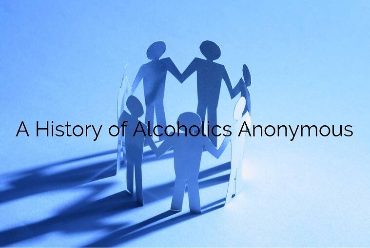 Paper cutout figures holding hands in a circle, symbolising the unity and support within Alcoholics Anonymous, against a blue background