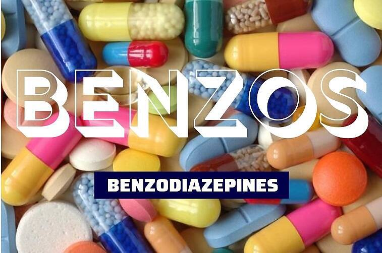 Close-up image of various colorful pills and capsules with text overlay reading "BENZOS" and "BENZODIAZEPINES", highlighting the prevalence and dangers of benzodiazepine use