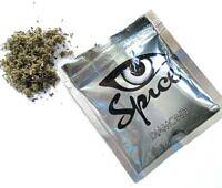 Packet of synthetic cannabis labeled "Spice Diamond" with eye logo, next to pile of dried herbal material, illustrating the appearance of dangerous synthetic drugs