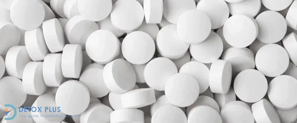 zapain pills out of packet in a pile