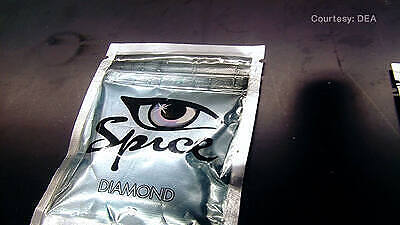 Package of 'Spice' synthetic cannabis, a banned legal high with dangerous effects, labeled 'Diamond' with an eye logo